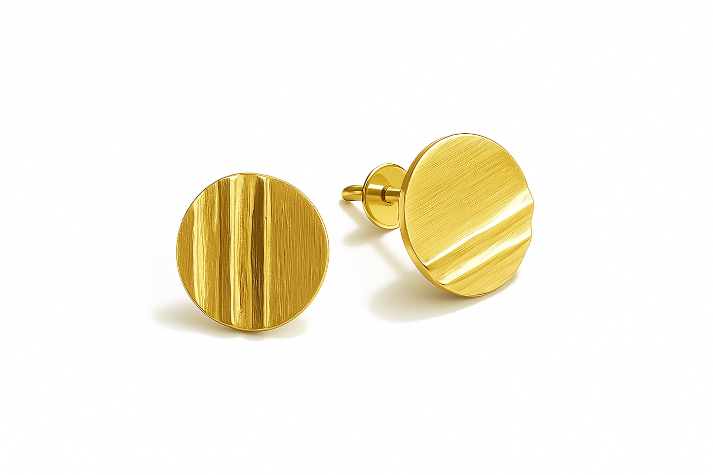 Gold round earrings on a white background
