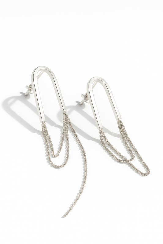 Silver chain earrings on a white background